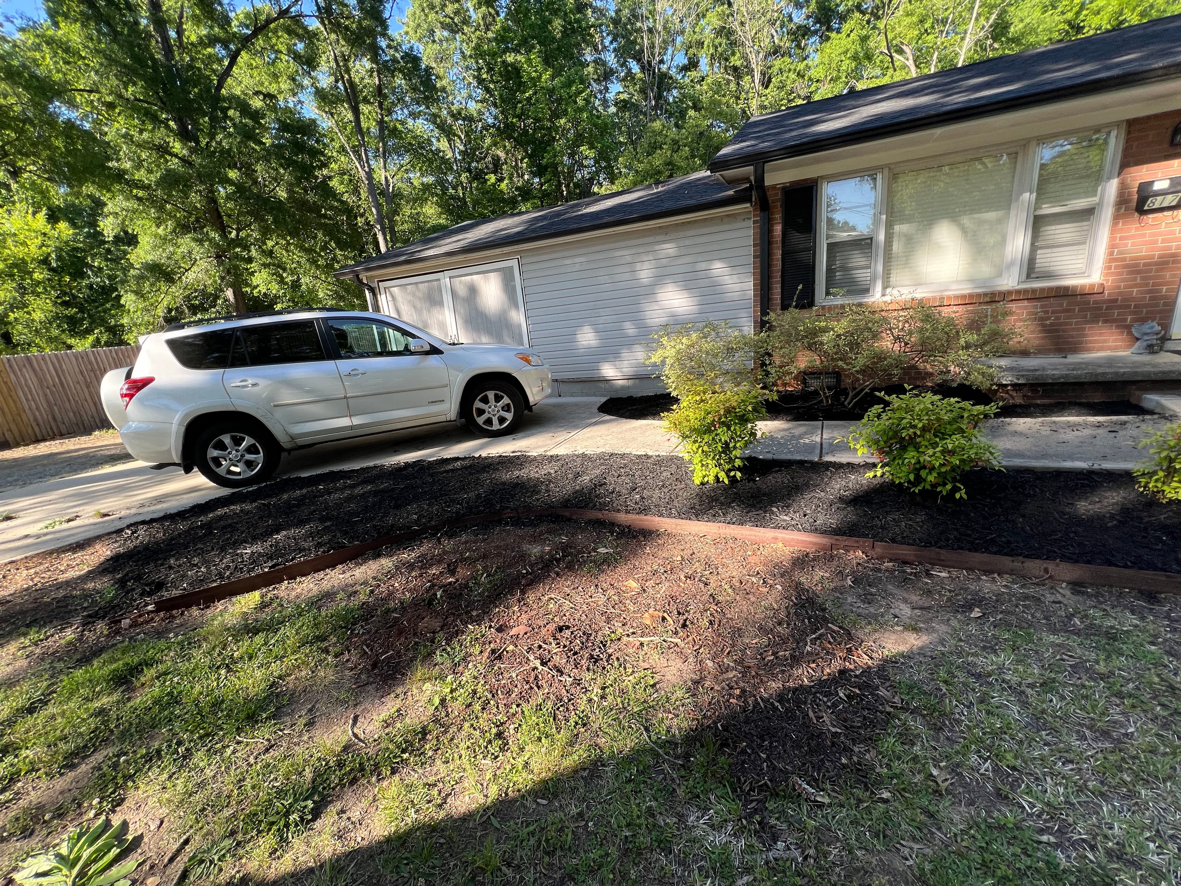 Project Fresh Mulch Installation Cleans Up This Rental Property image