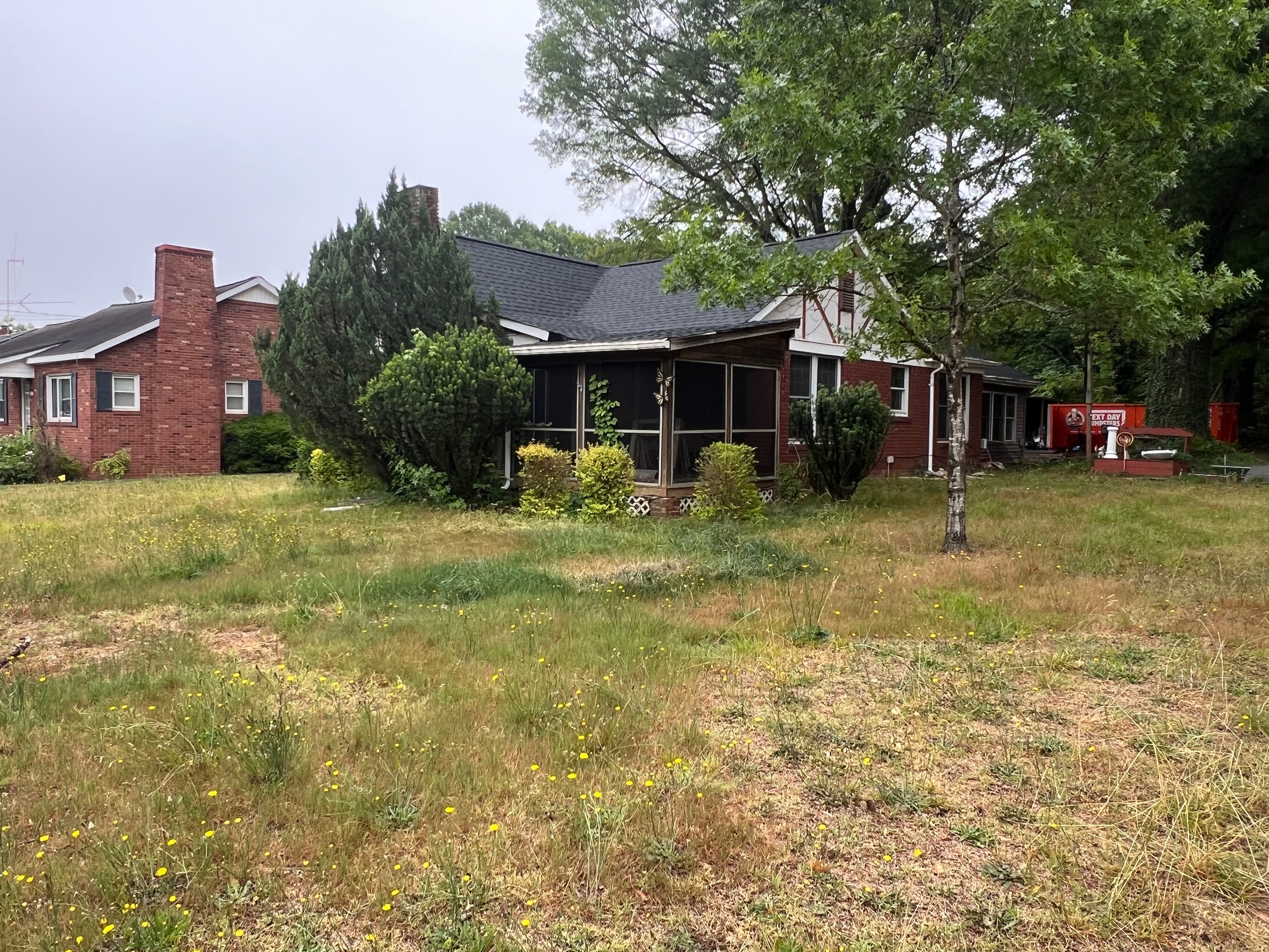 Project Investor Property Cleanup - Lawn Mowing and Shrub Trimming Done Right image