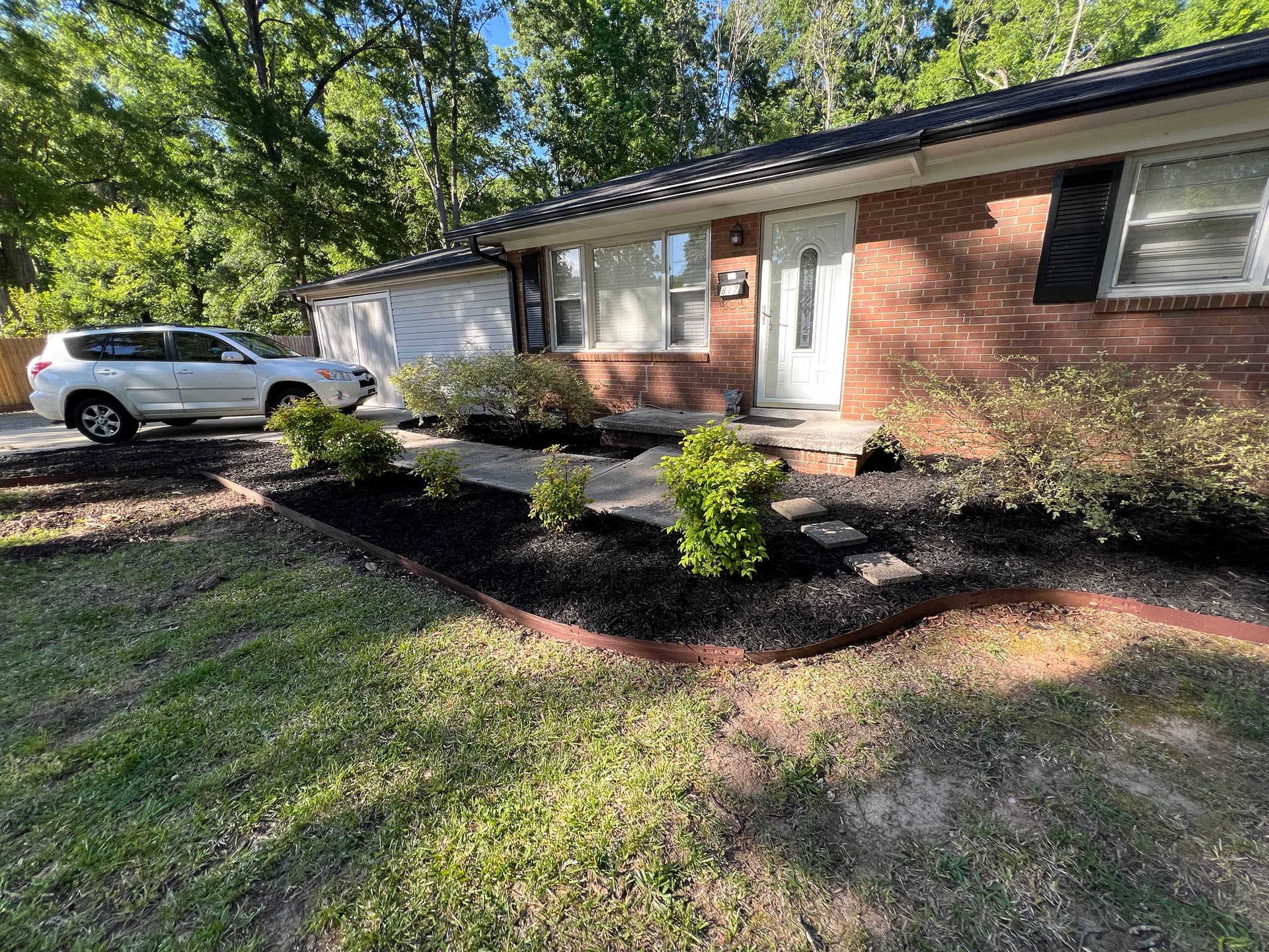 Fresh Mulch Installation Cleans Up This Rental Property