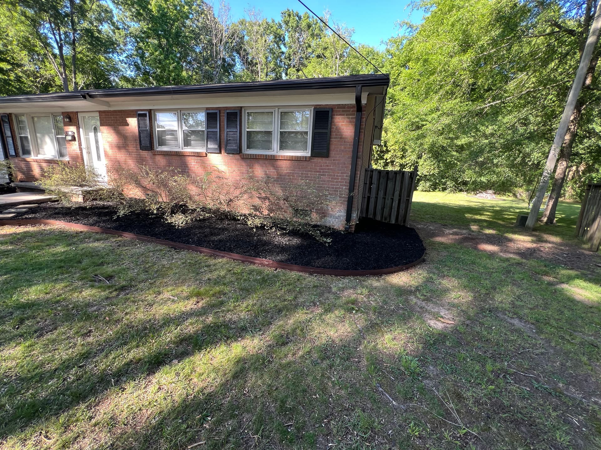 Fresh Mulch Installation Cleans Up This Rental Property